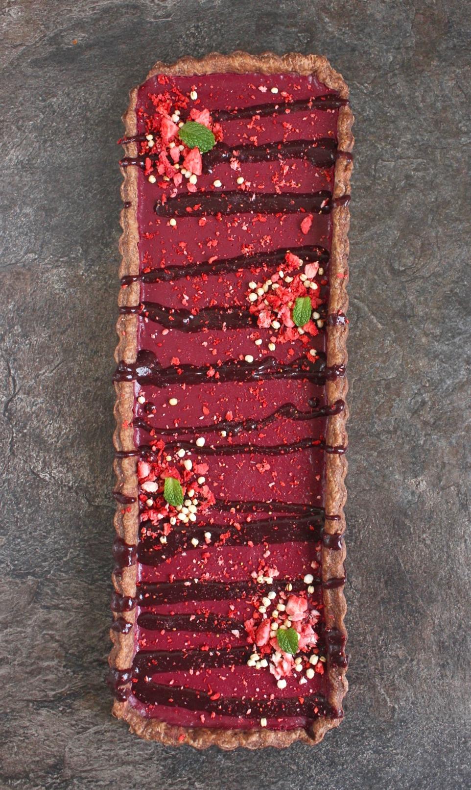 Tart from above on a grey surface.