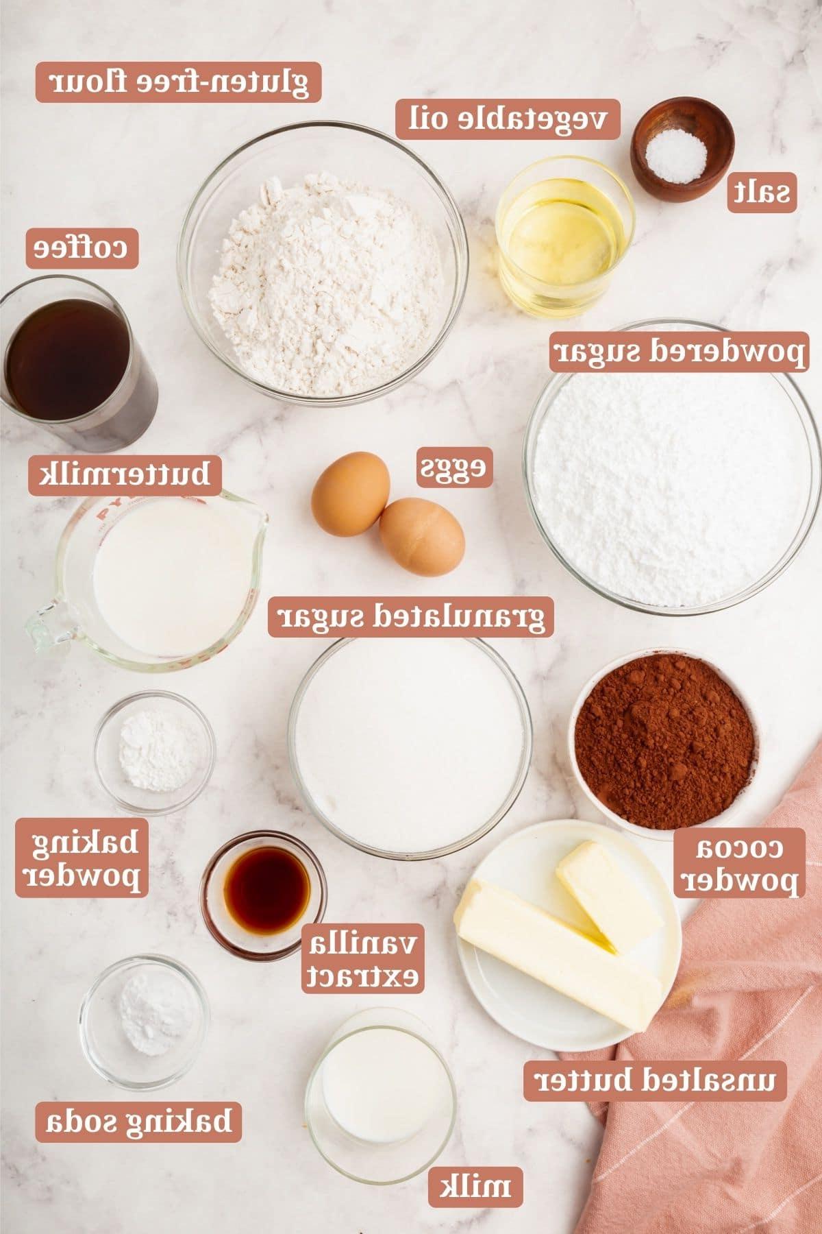 Ingredients for making a gluten-free chocolate cake with chocolate frosting.