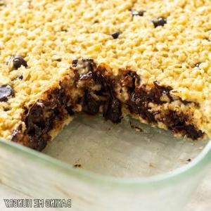 baked chocolate chip oatmeal recipe in baking dish missing piece