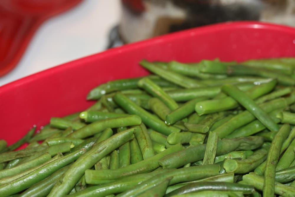Green Beans Seasoned with Italian Dressing washed and trimmed green beans in a steamer